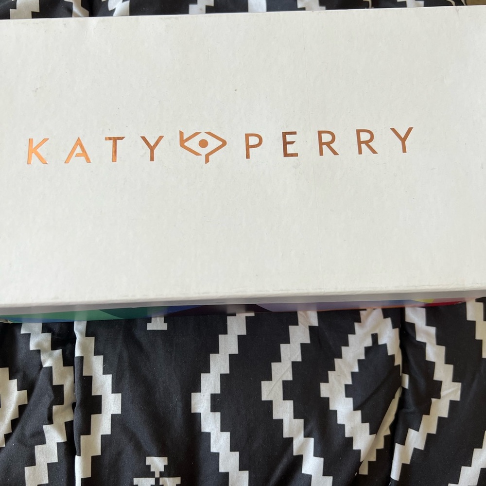 Katy perry gold metallic flats.